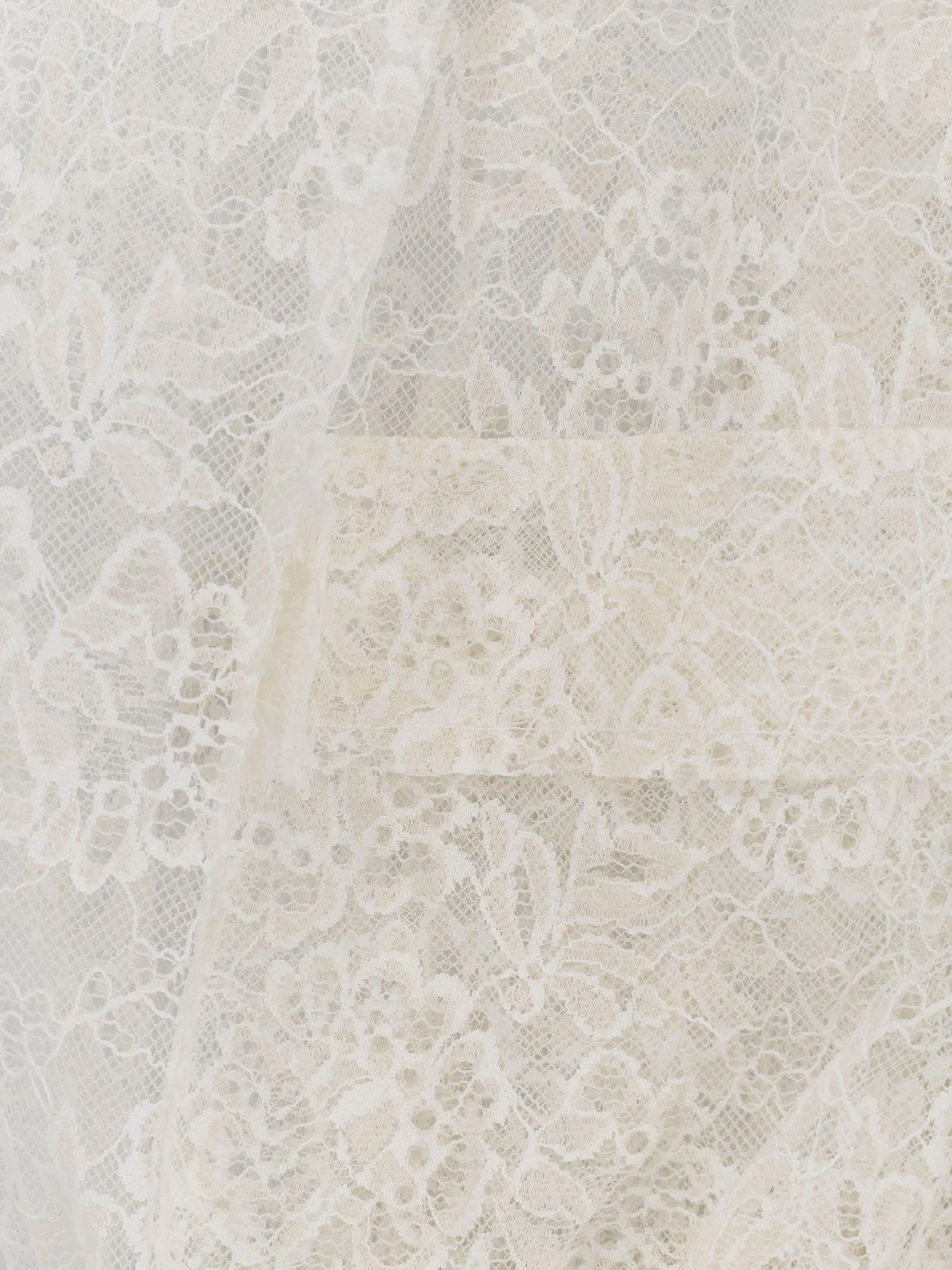 Sleeveless lace jacket.webp