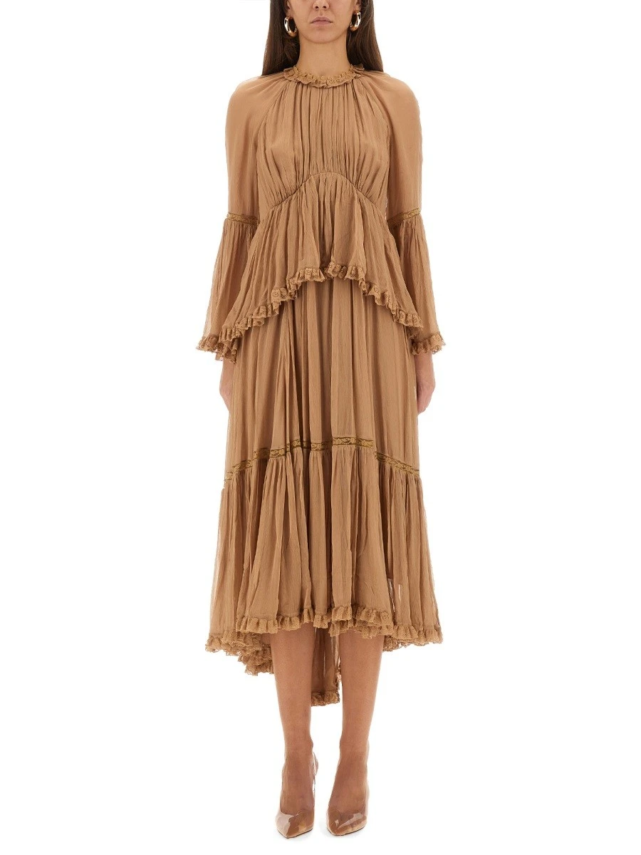 "HYPNOTIC PEPLUM" RUFFLE DRESS.webp