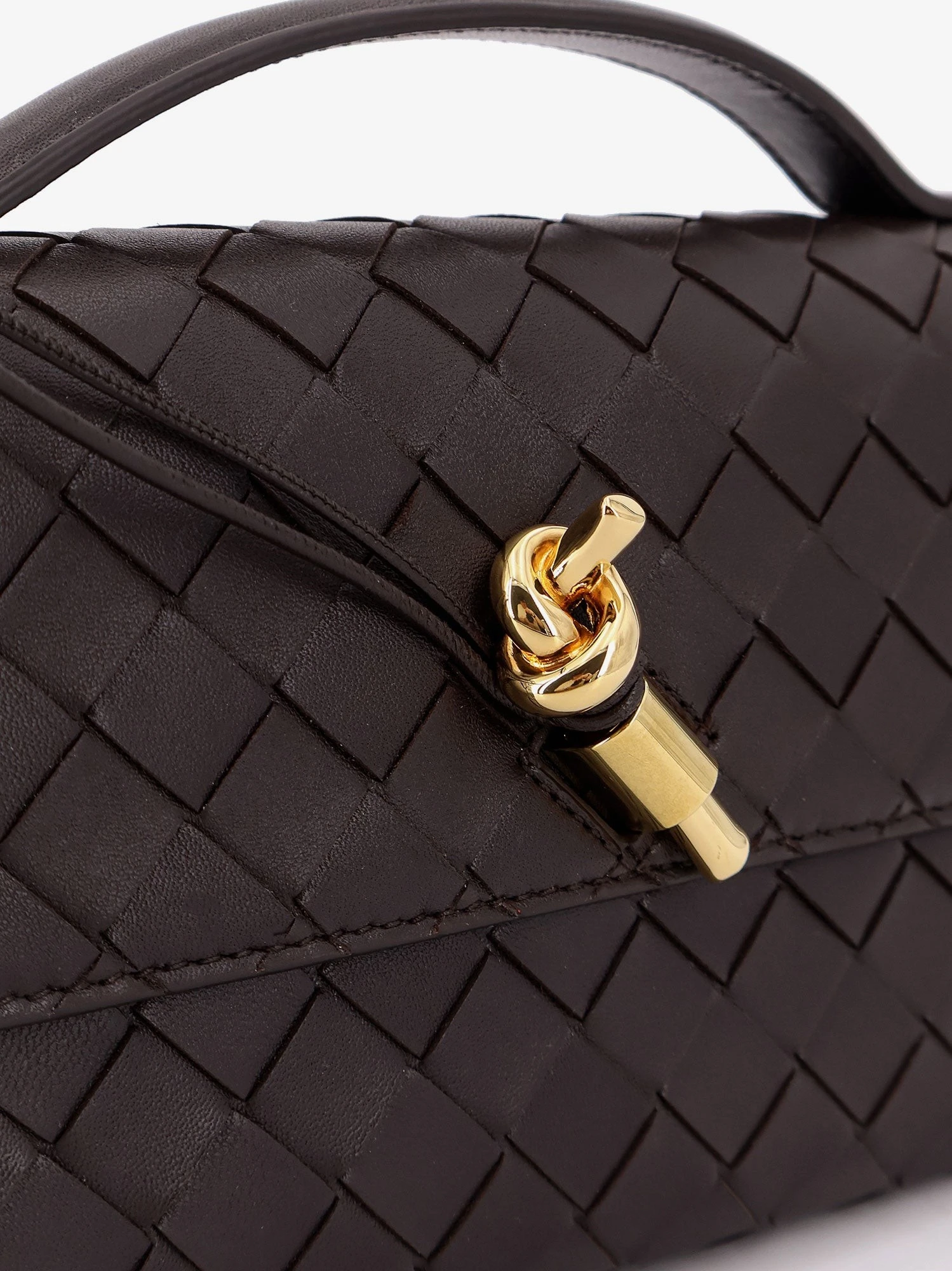 Andiamo Leather Clutch with Intrecciato motif.webp