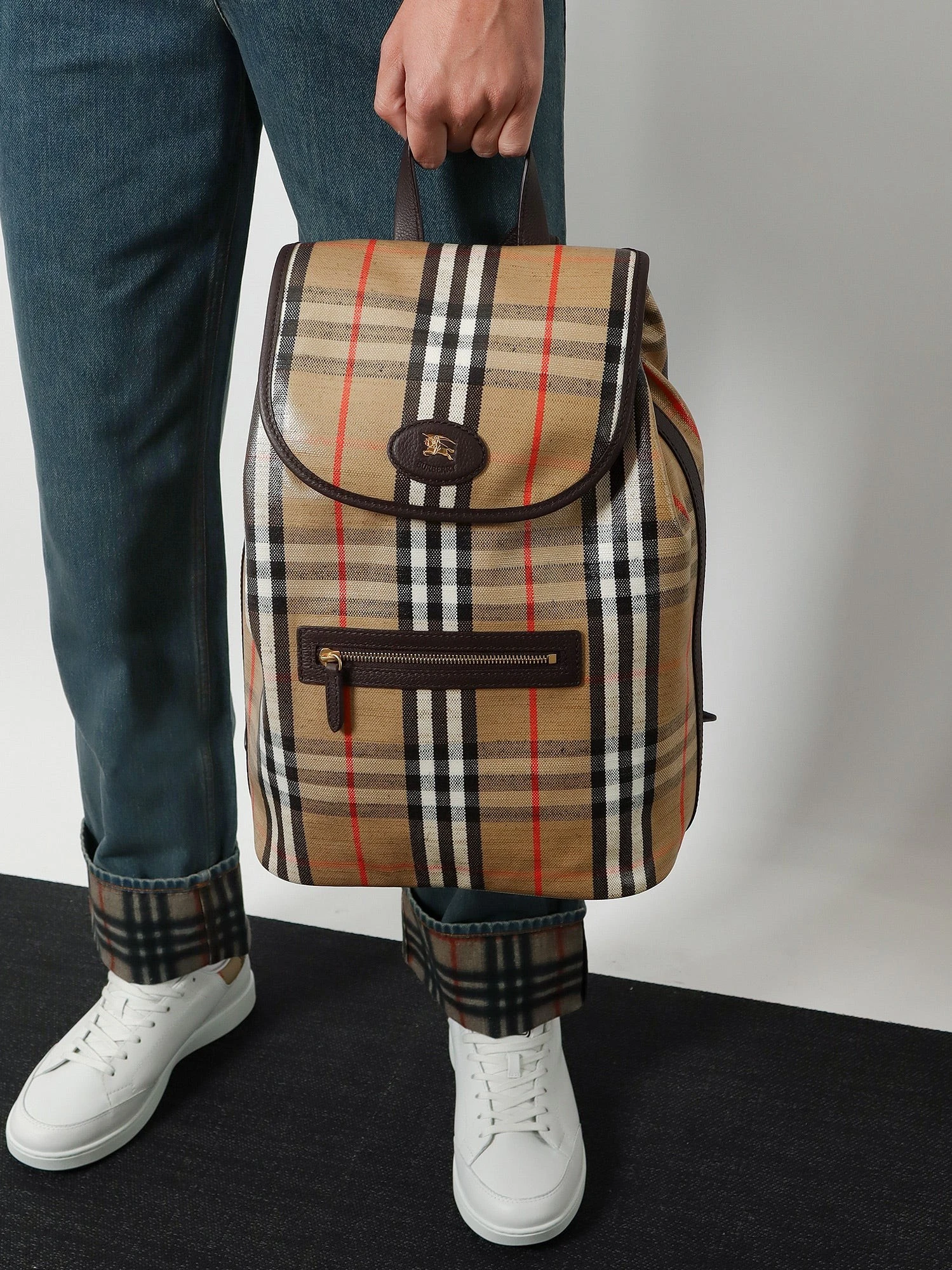 Highlands coated canvas backpack with front logo.webp