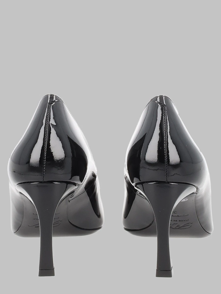 DÉCOLLETÉ "TROMPETTE" IN VERNICE.webp