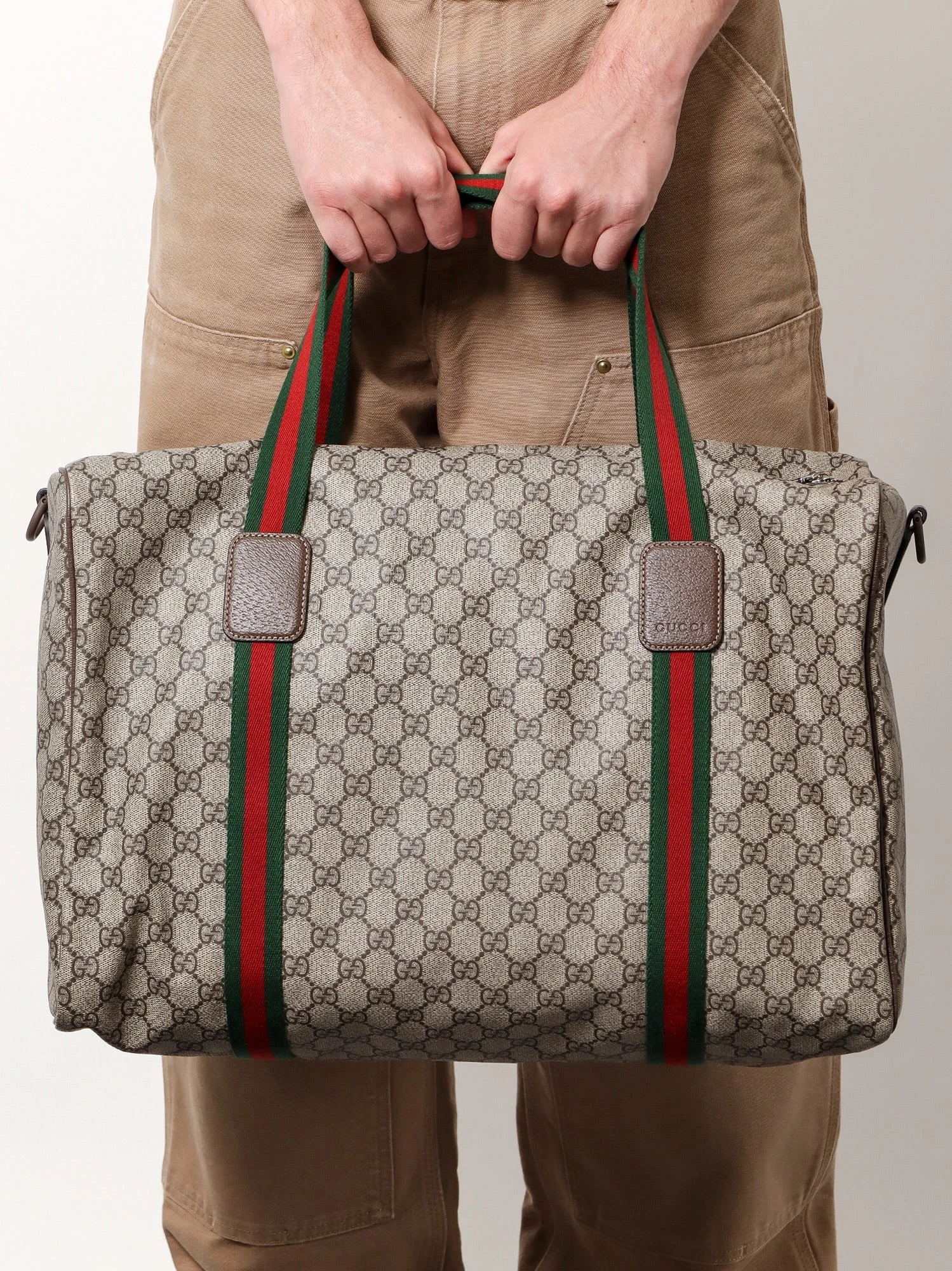 GG Supreme Fabric and leather travel bag with Web detail.webp