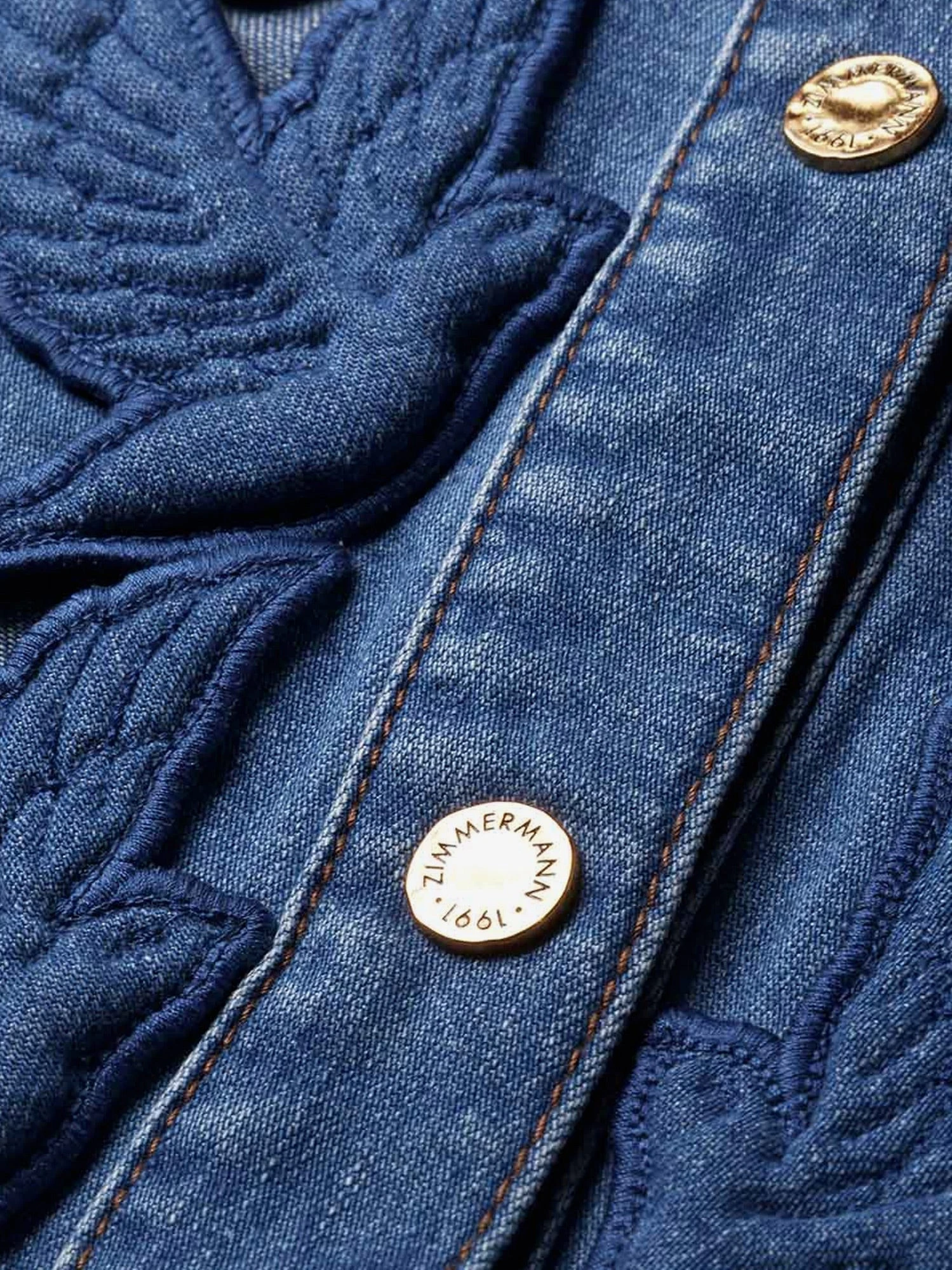 Denim shirt with cut-out embroidery.webp