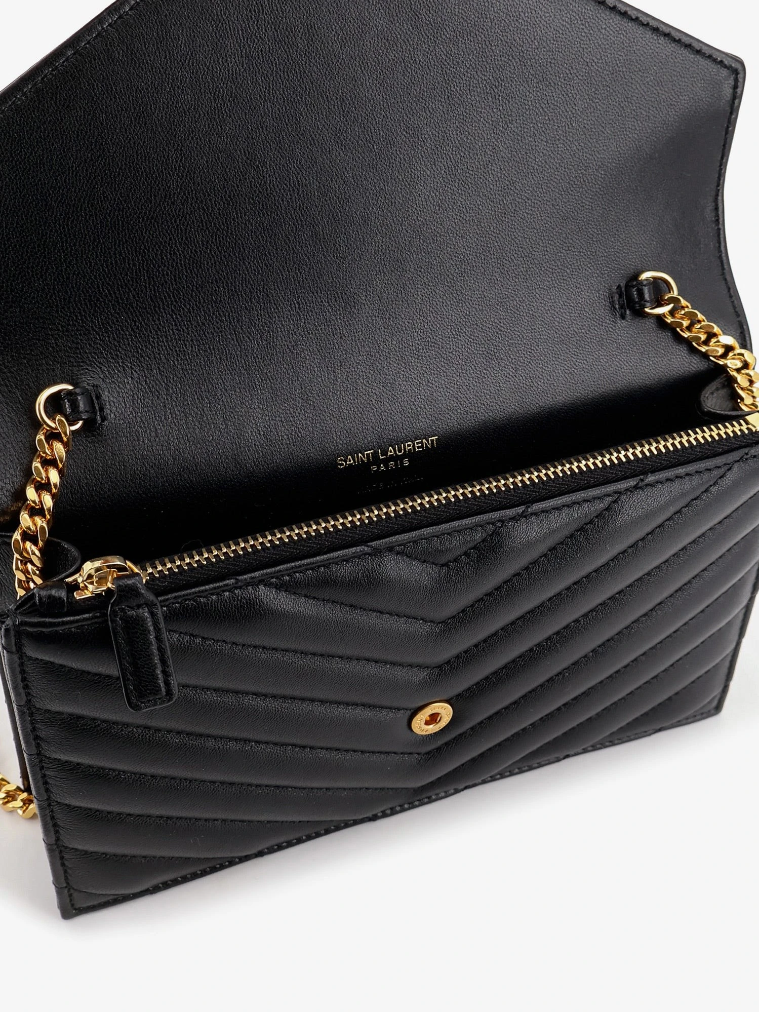 Leather crossbody bag with metal Cassandre logo.webp