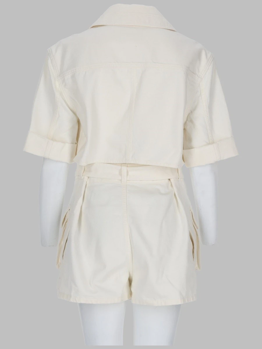 JUMPSUIT CON CINTURA IN DENIM.webp