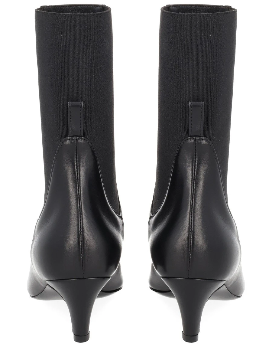 HEELED BOOT.webp