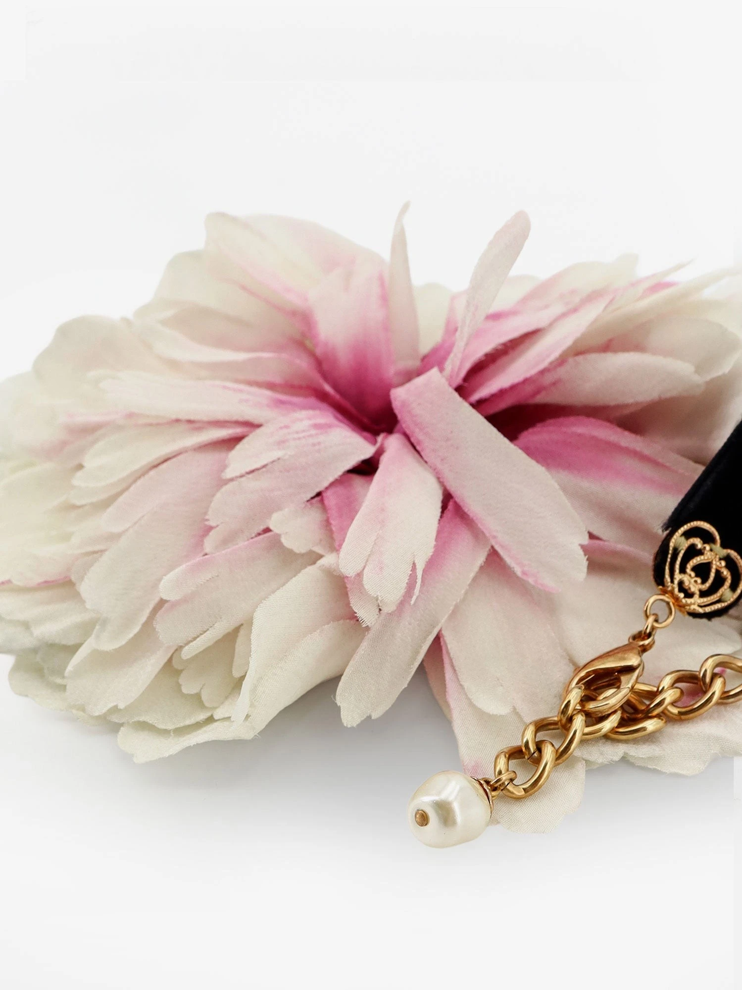 Bracelet with oversized flower detail.webp