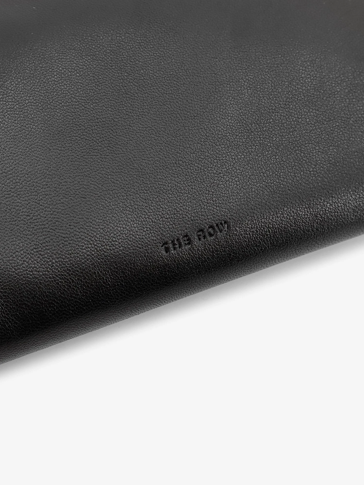 Ray leather clutch bag.webp