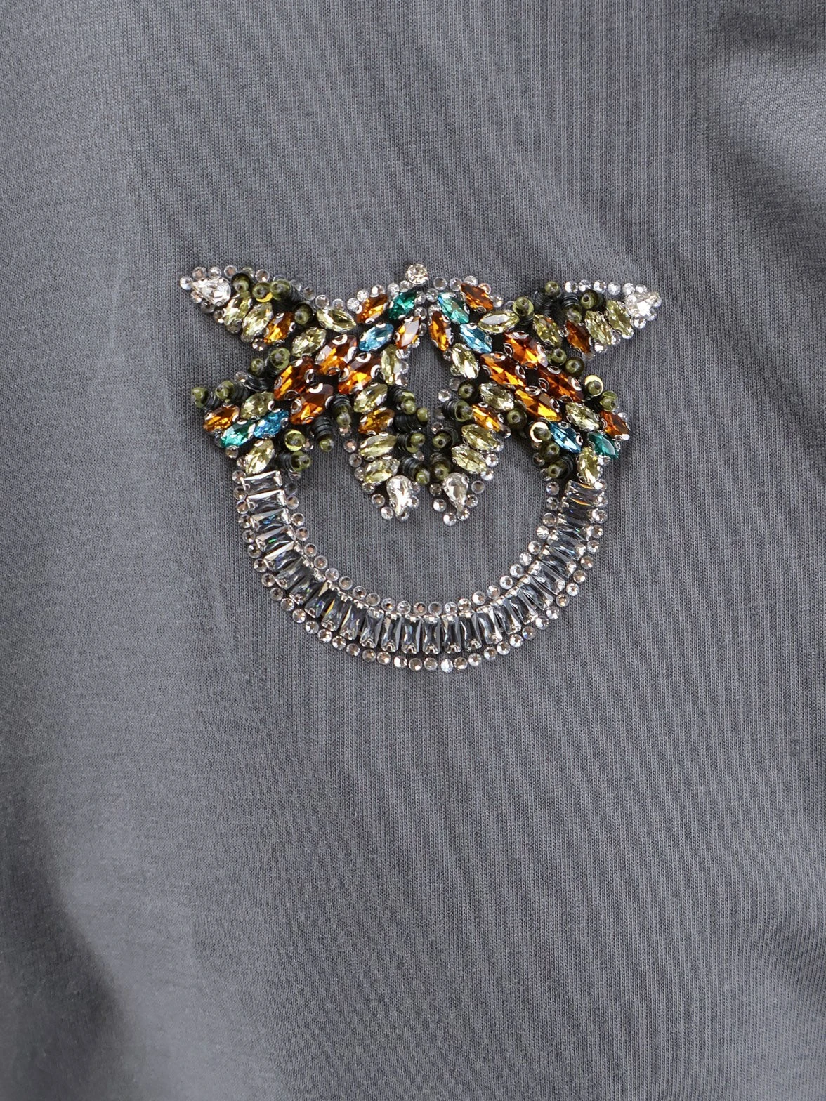Cotton T-shirt with Love Birds logo on the front.webp