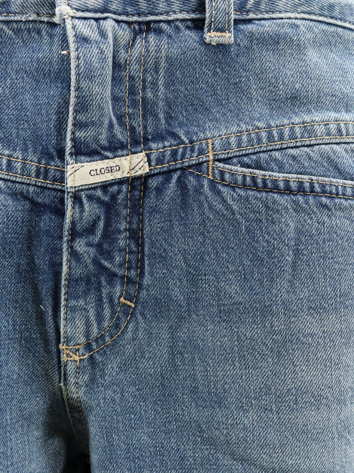 Tory-X blue denim jeans.webp