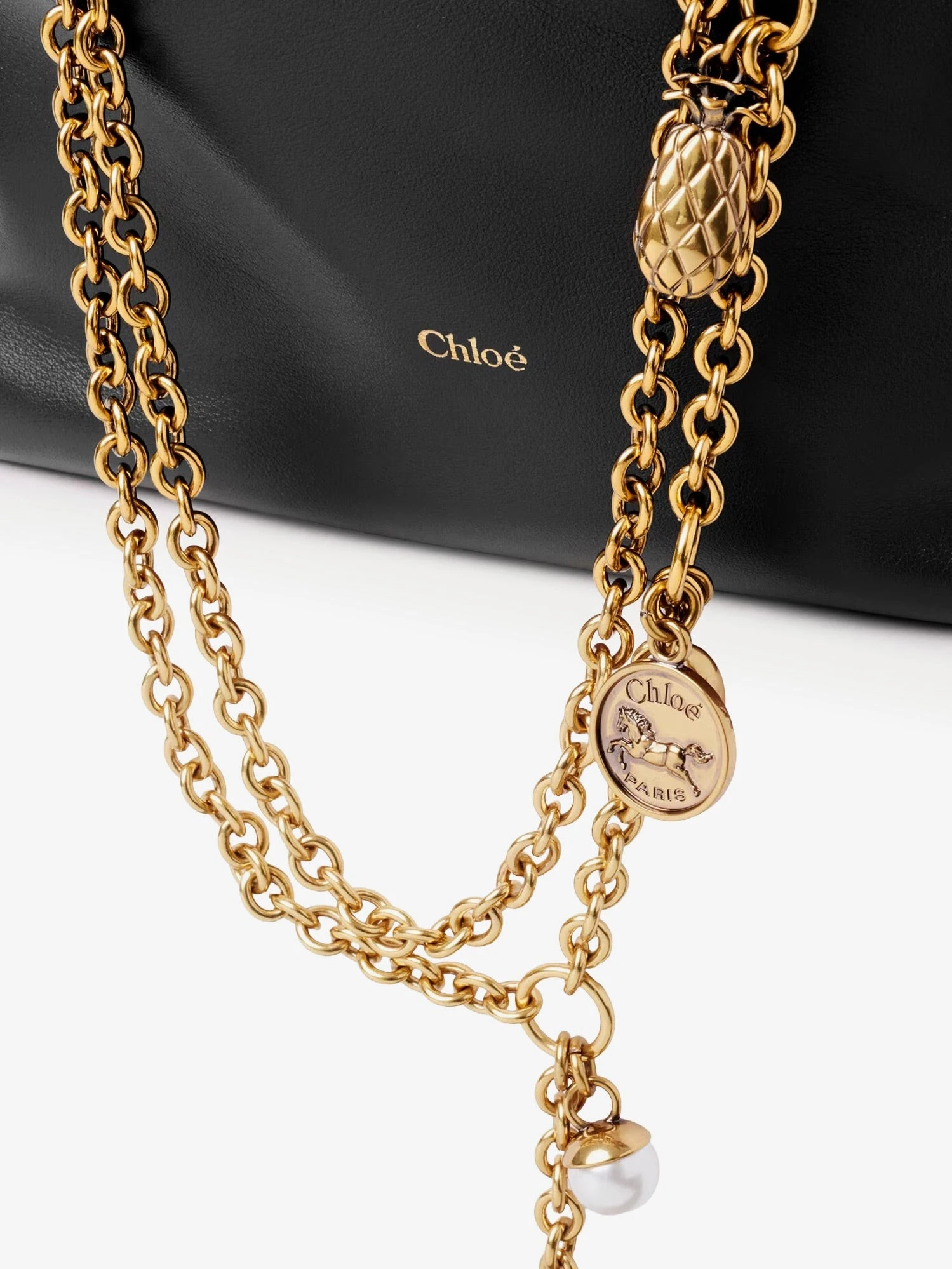 Chloé Icons leather crossbody bag with front logo.webp