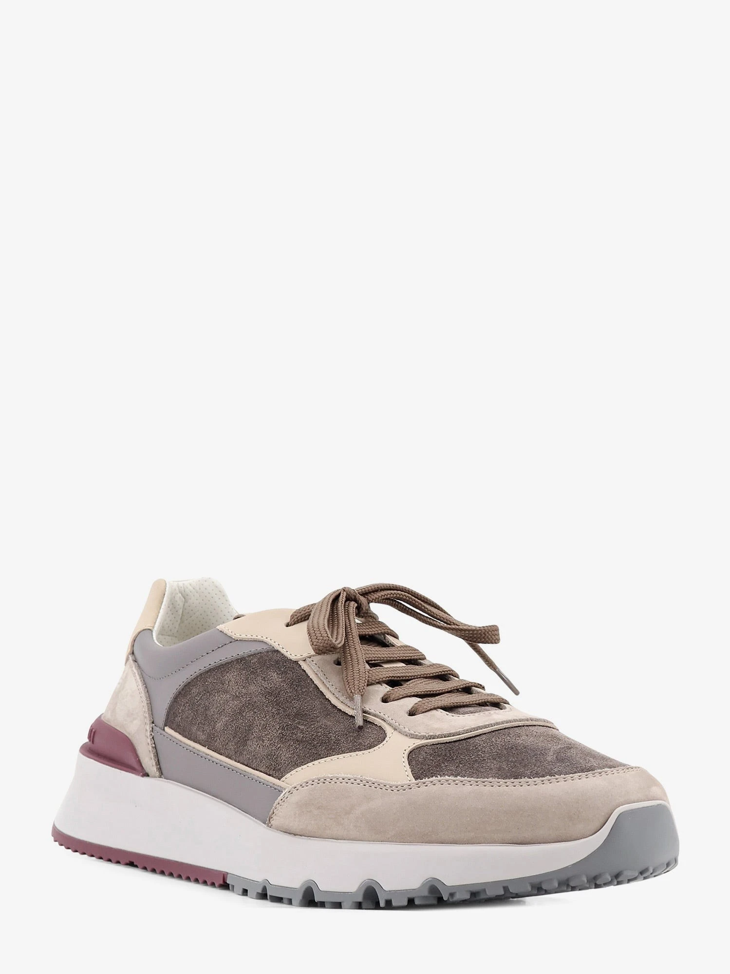 Suede sneakers with leather inserts.webp