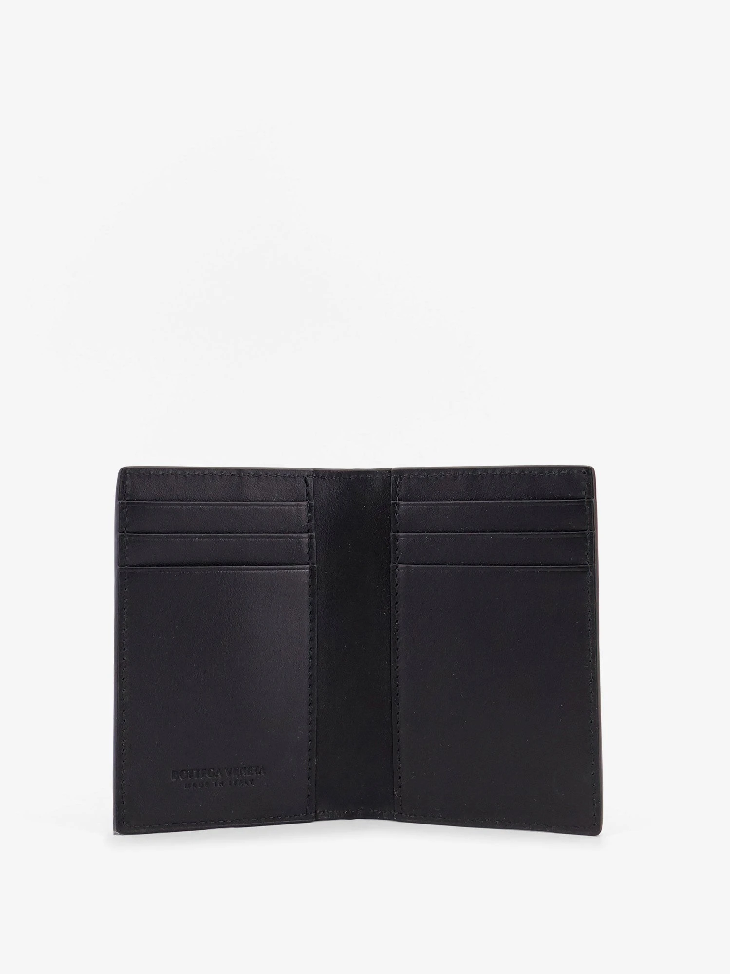 Leather card holder with Intrecciato pattern.webp