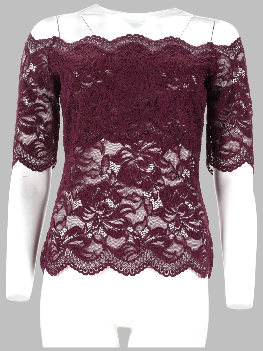 TOP CON SPALLE SCOPERTE.webp