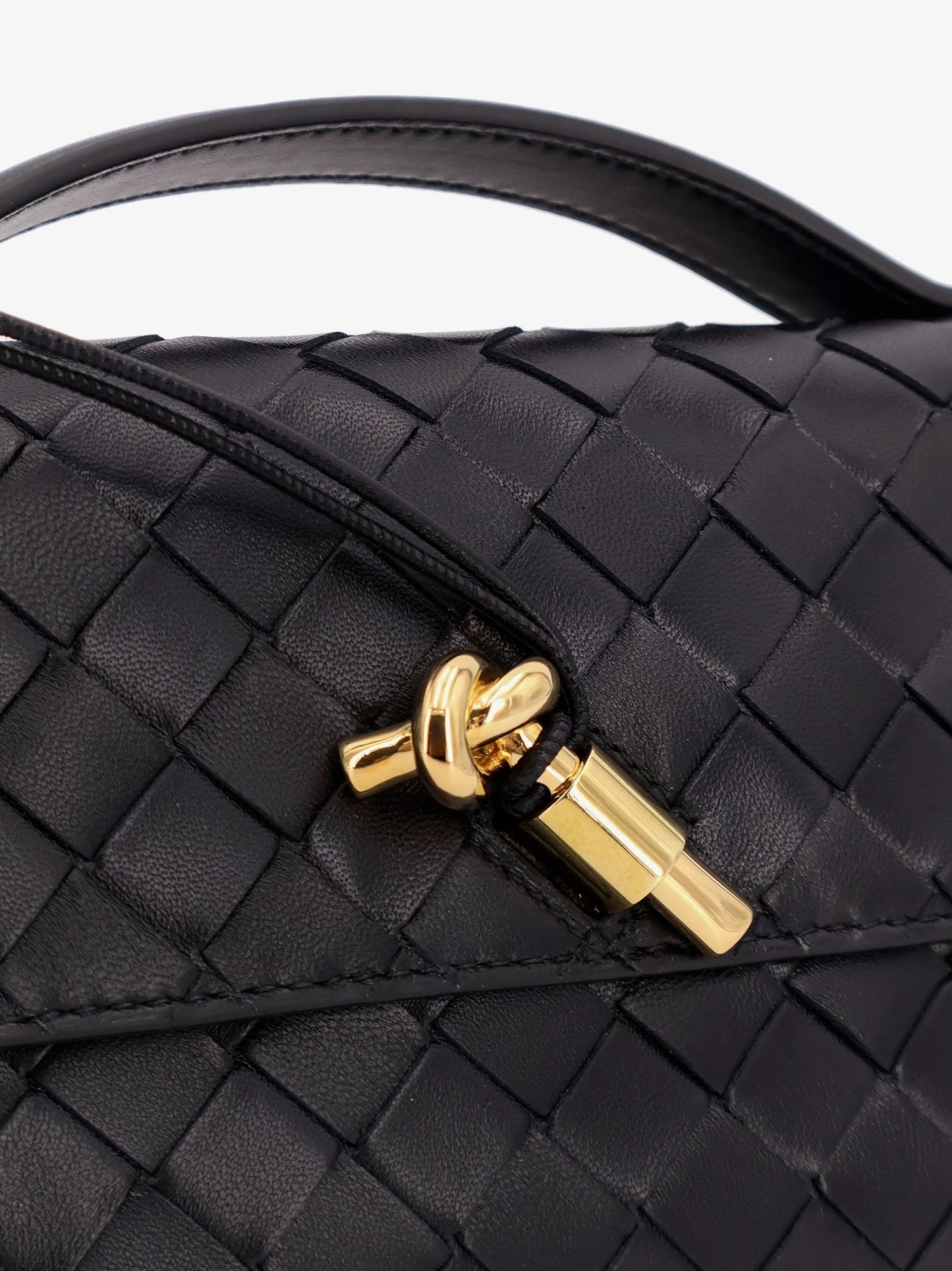Andiamo Leather Clutch with Intrecciato Pattern.webp