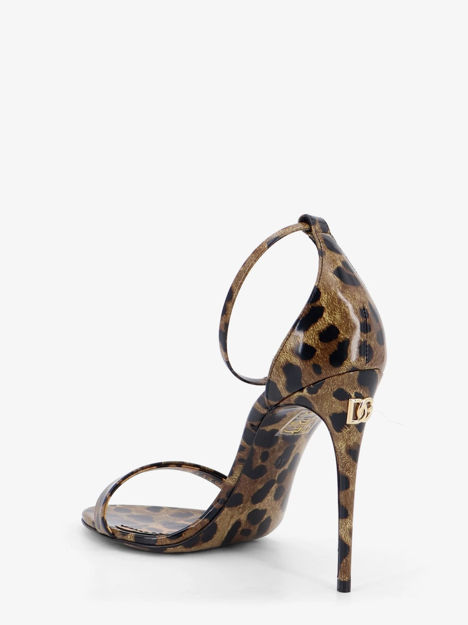 Leather sandals with leo print.webp