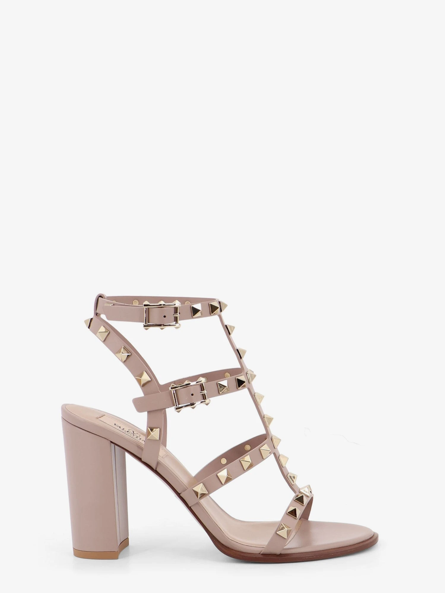 Rockstud leather sandals with iconic all-over studs.webp