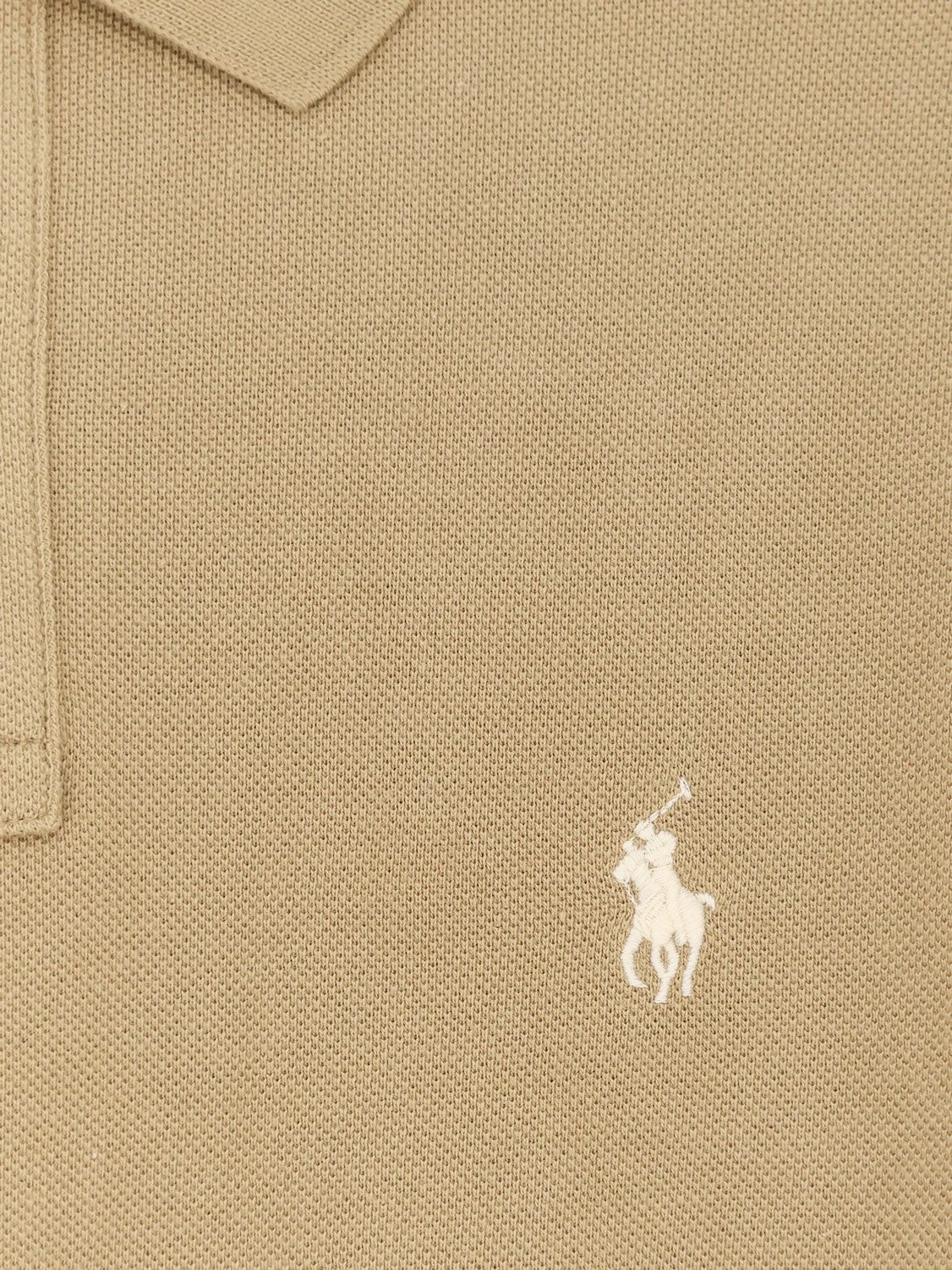 Cotton polo shirt with frontal logo embroidery.webp
