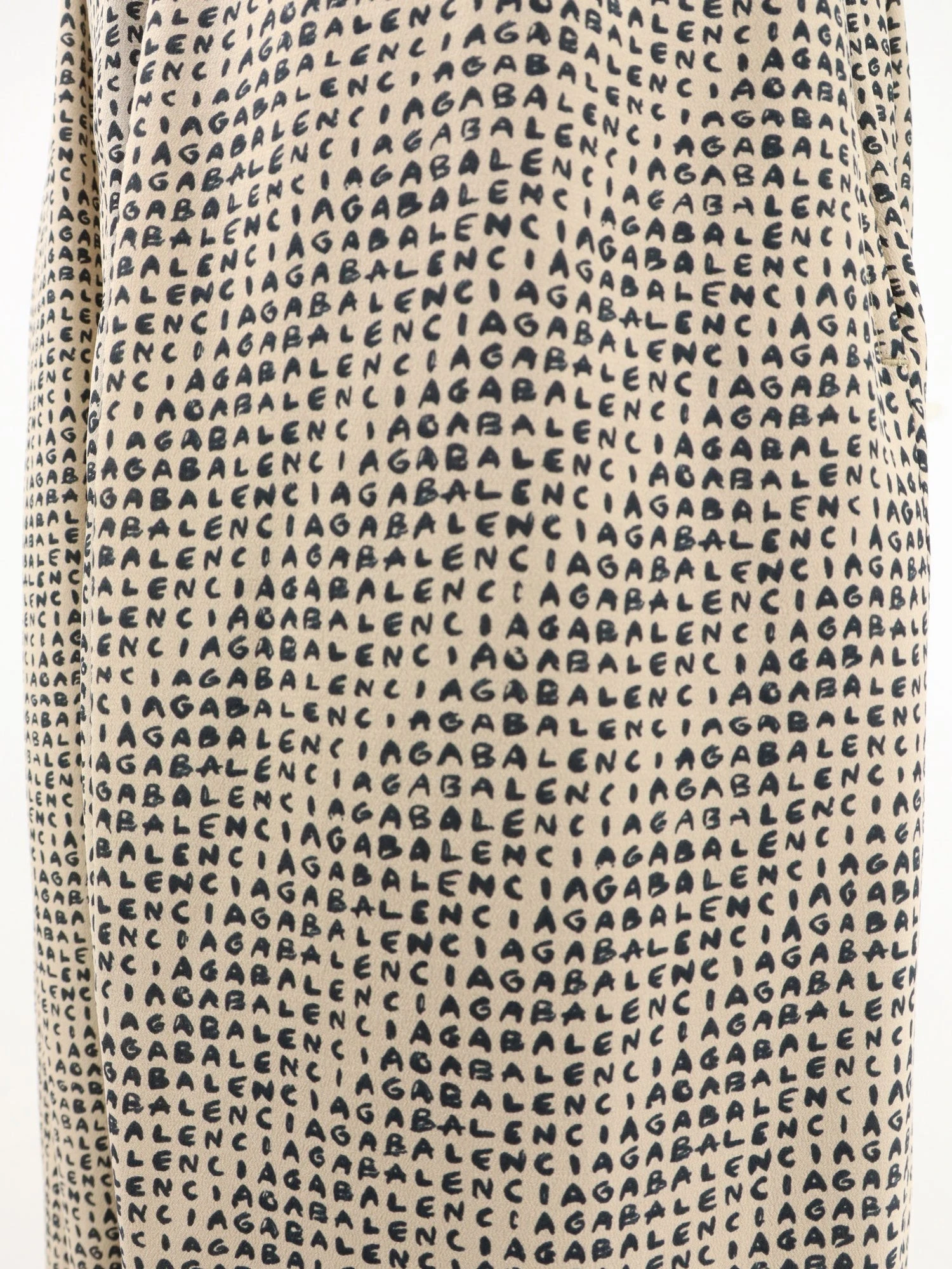 Monogram silk trousers.webp