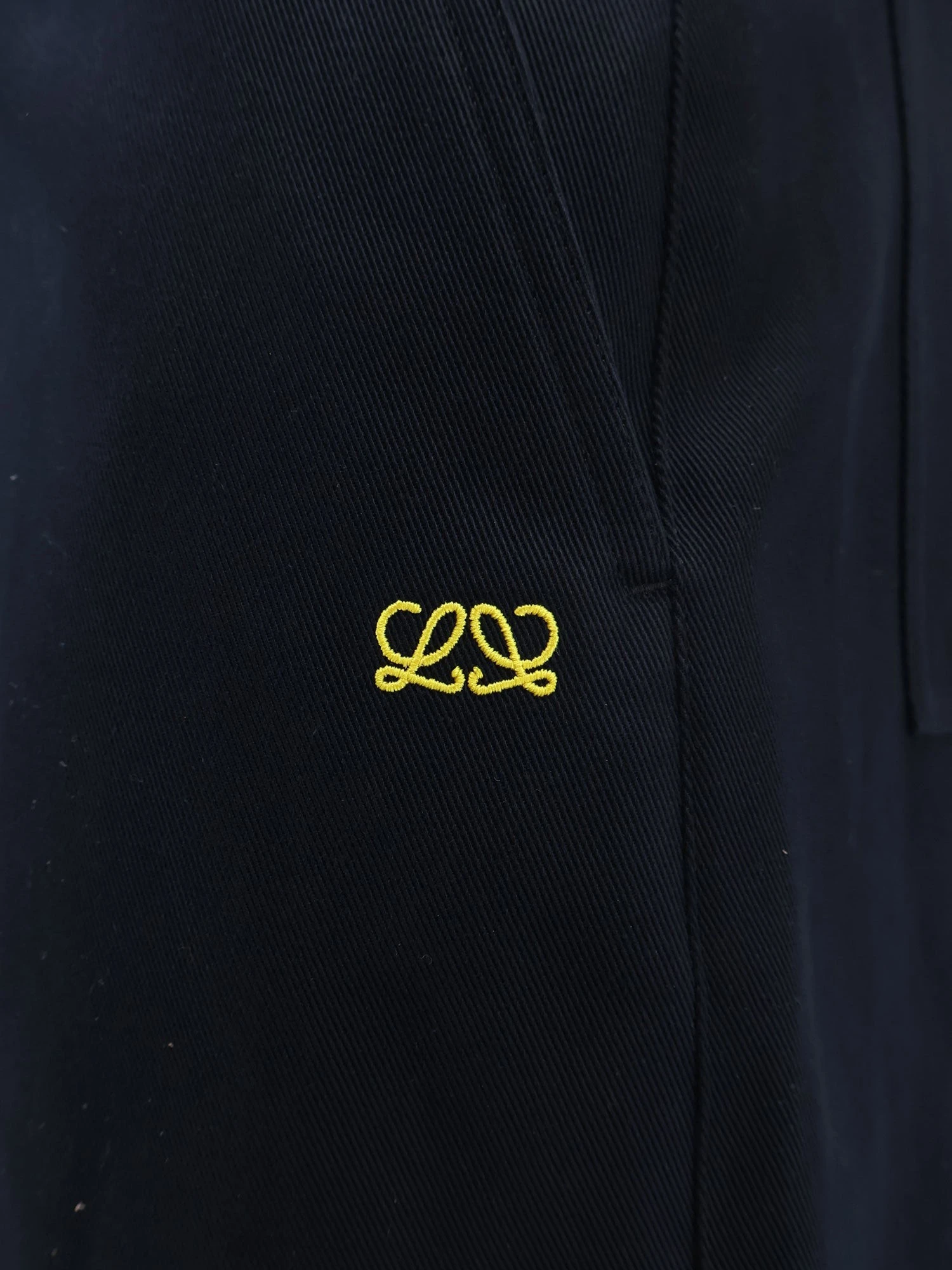 Denim trousers with contrasting embroidered logo.webp