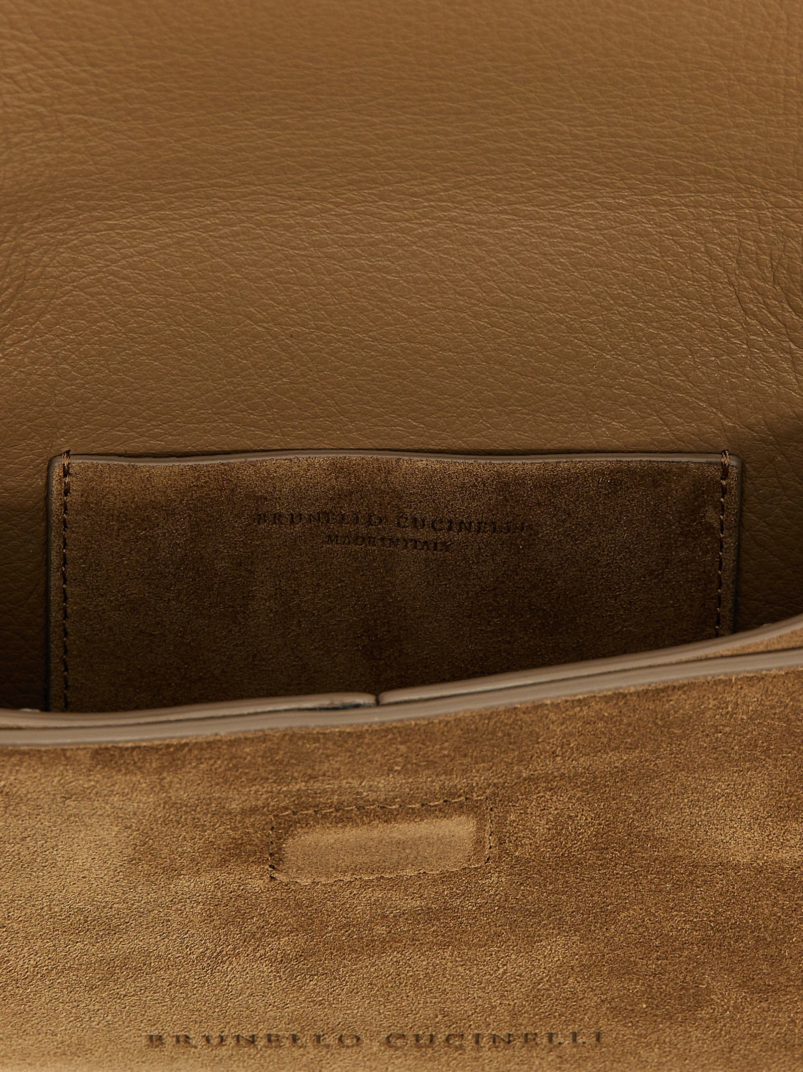 Monile suede clutch bag