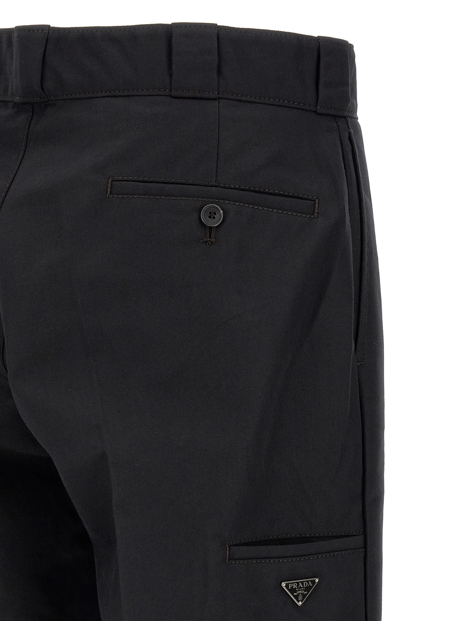 Canvas pants with pleat
