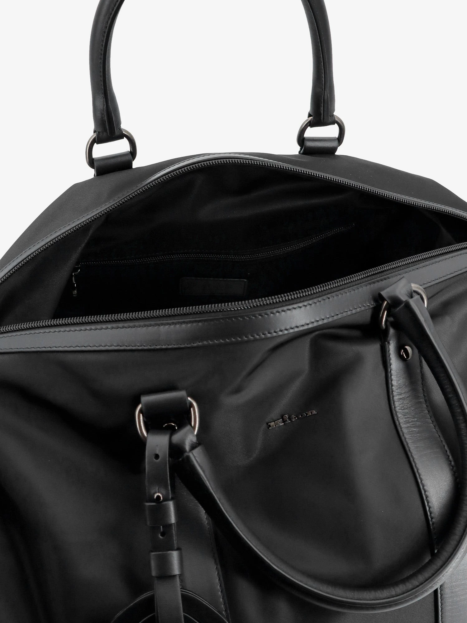 Nylon travel bag with leather inserts