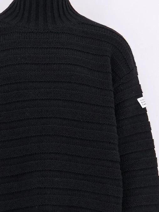 Wool blend sweater with distressed effect