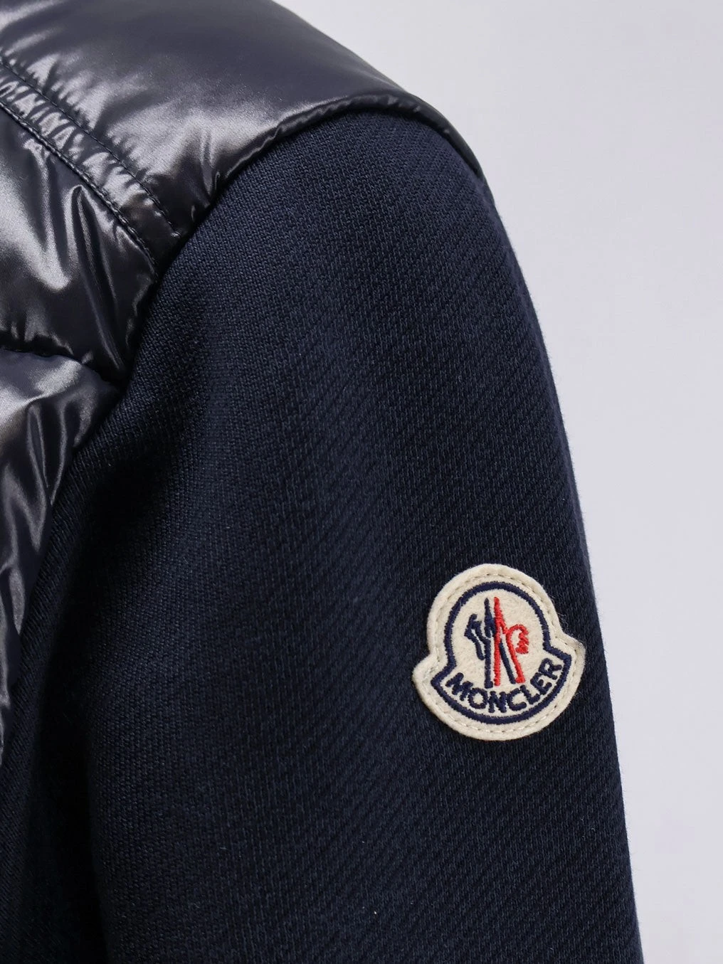 Padded jacket with fabric details