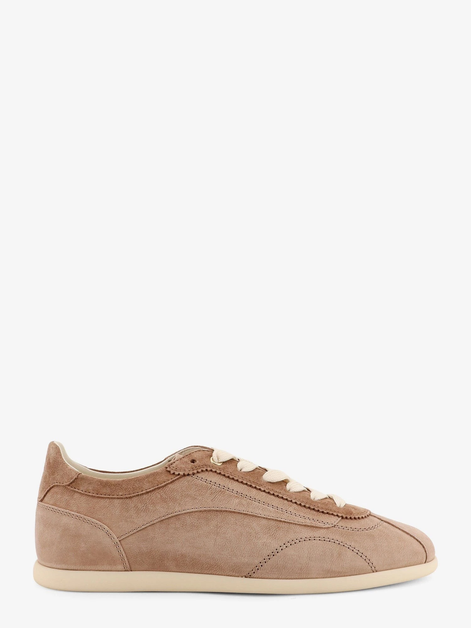 Leather sneakers with stitching detail.webp