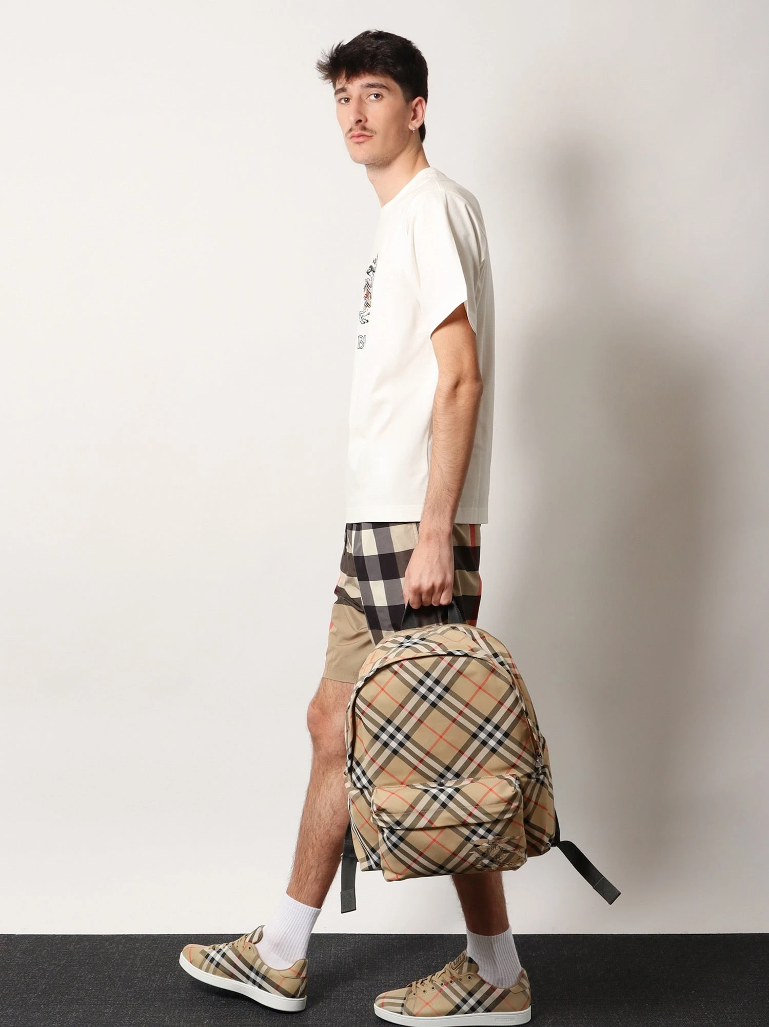 Essential backpack with Check pattern.webp