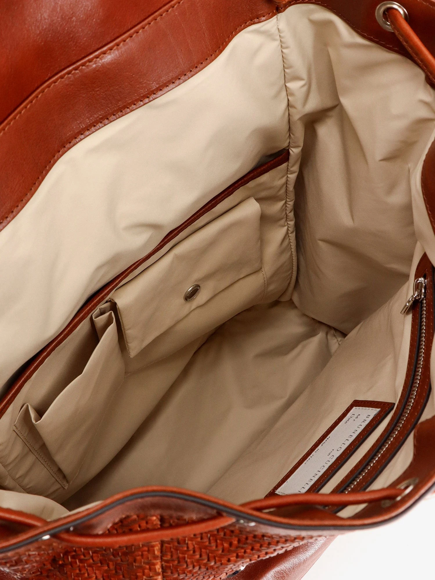 City leather backpack with engraved lettering logo.webp