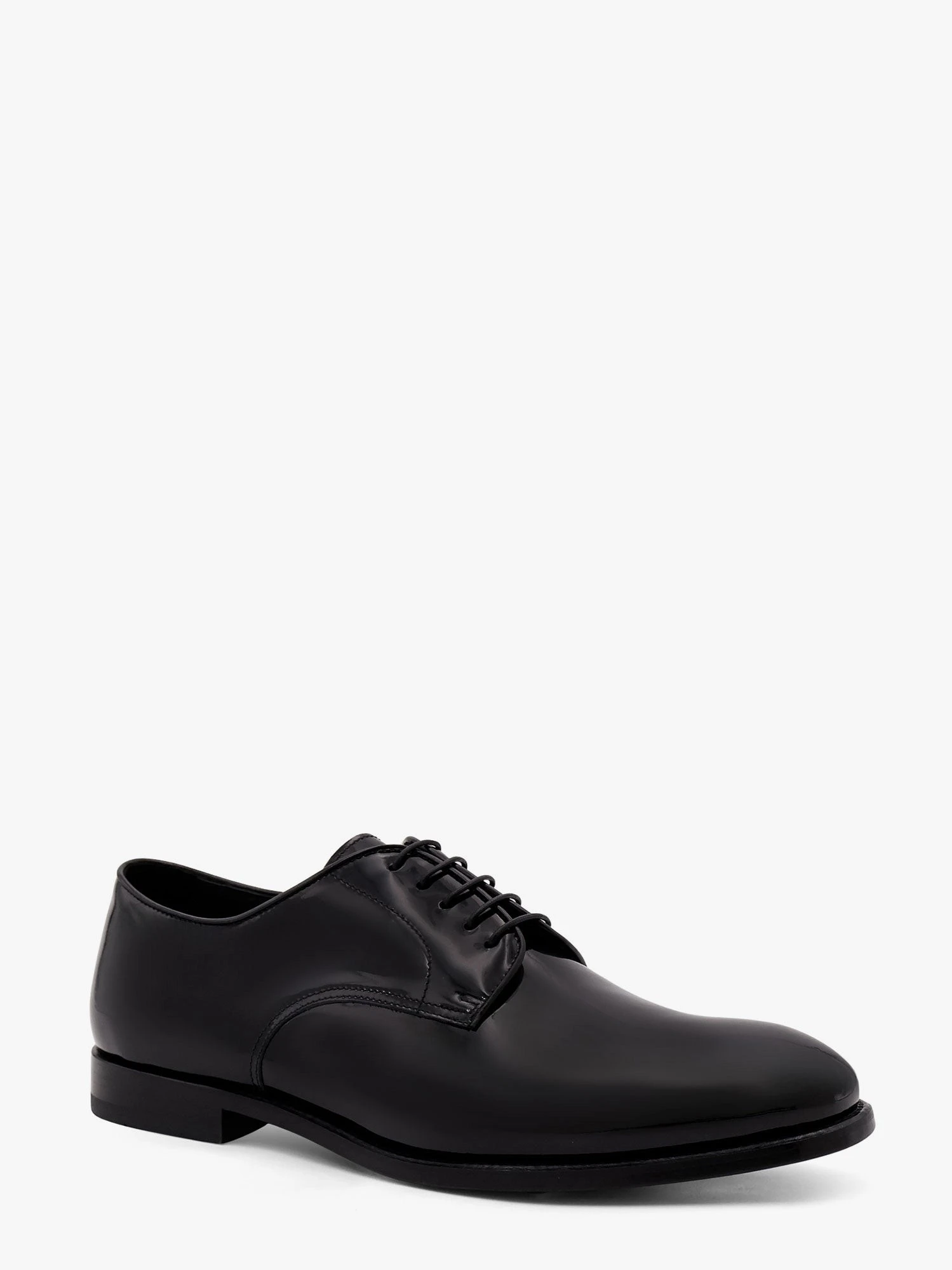 Lace-up patent leather shoe.webp