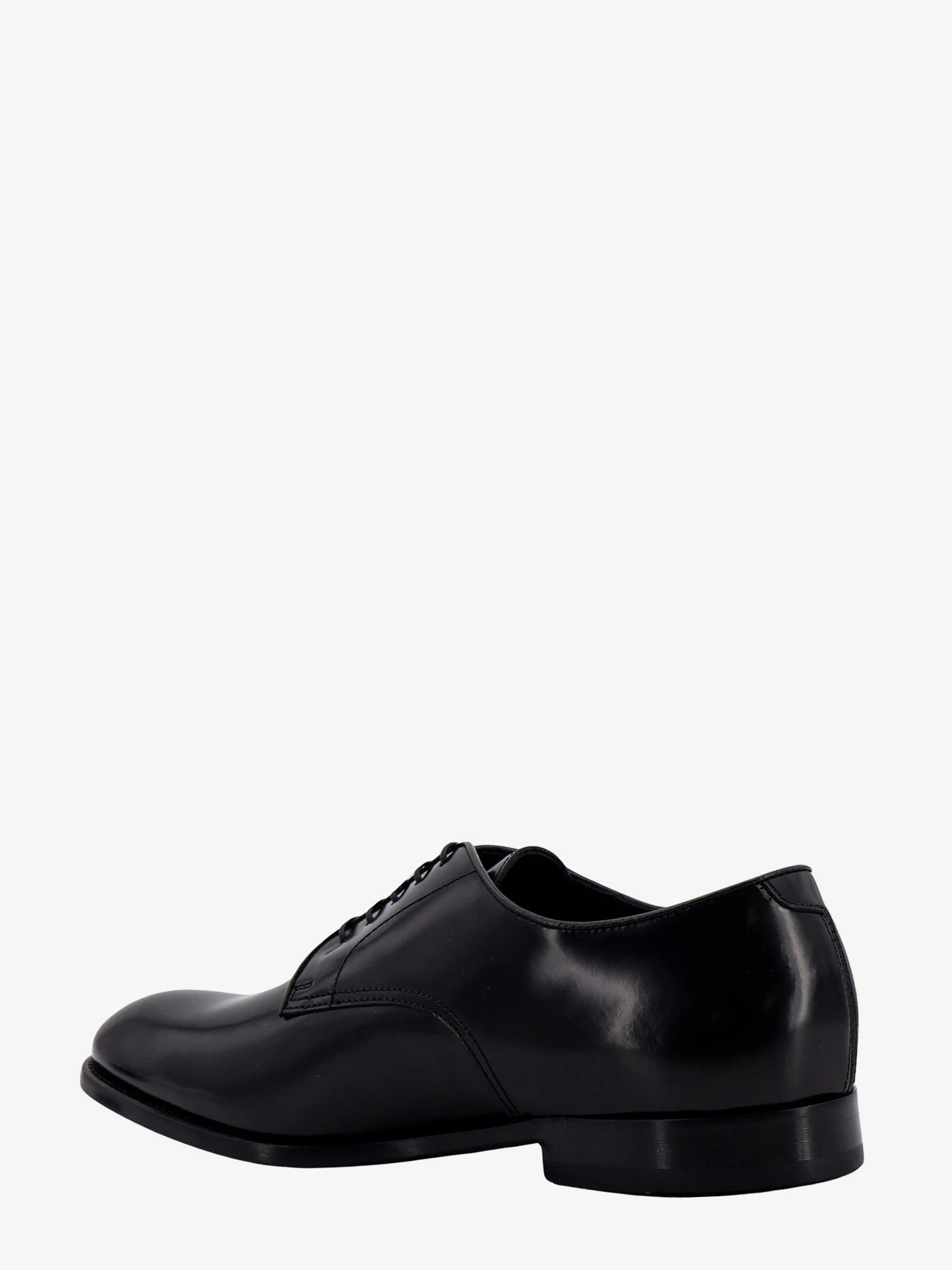 Patent leather lace-up shoe.webp