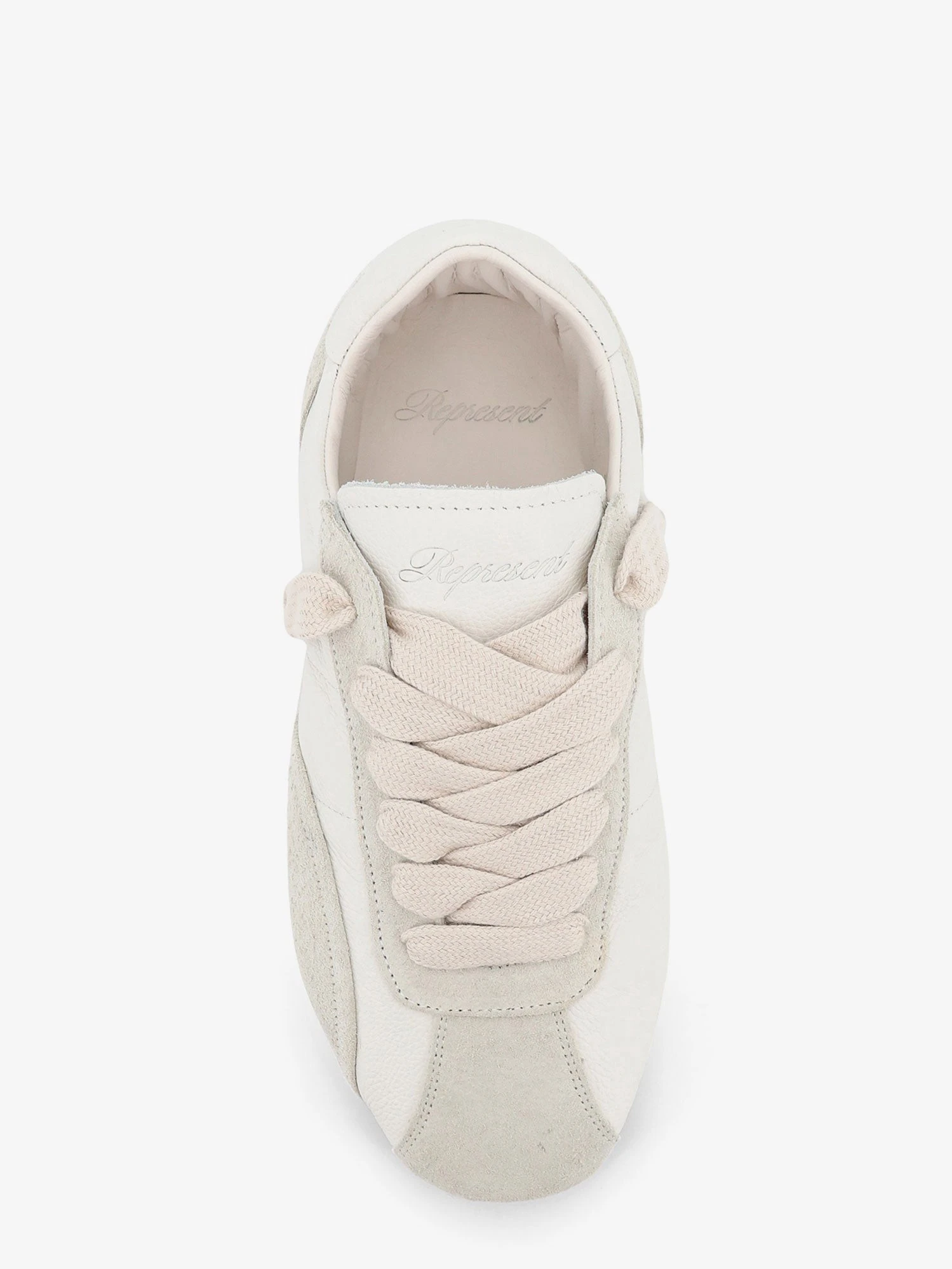 Leather and suede sneakers with engraved logo on the tongue.webp