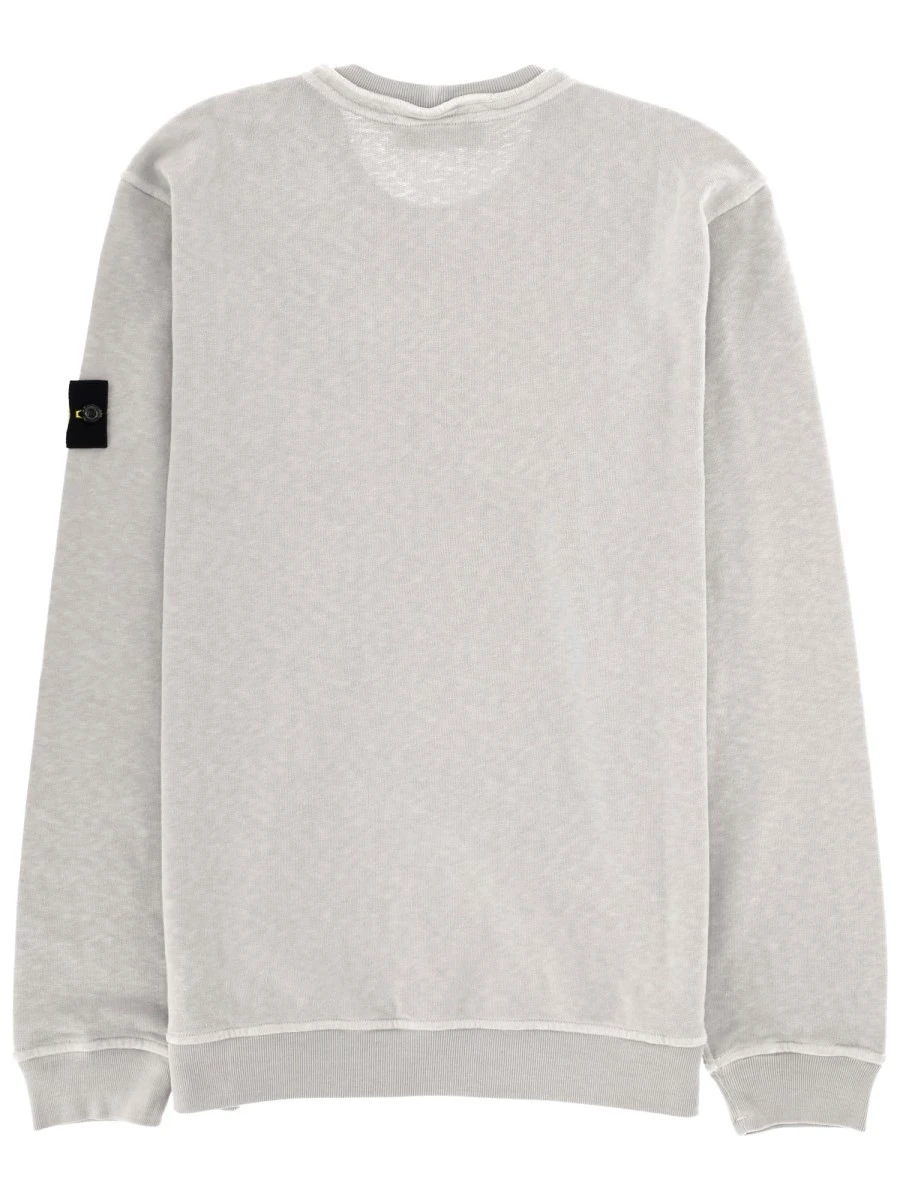 FELPA CON PATCH LOGO.webp