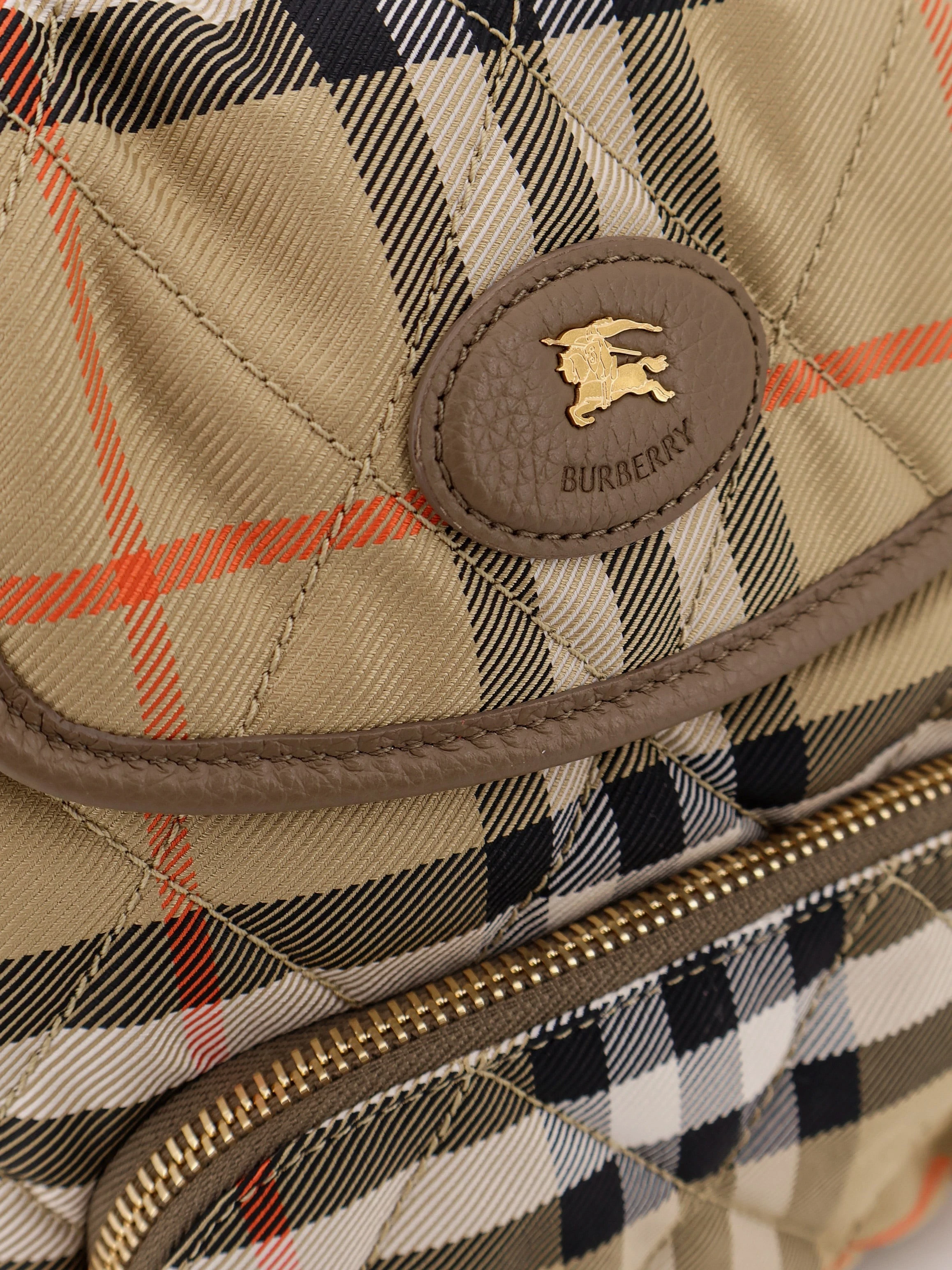 Horseshoe nylon backpack with check pattern.webp