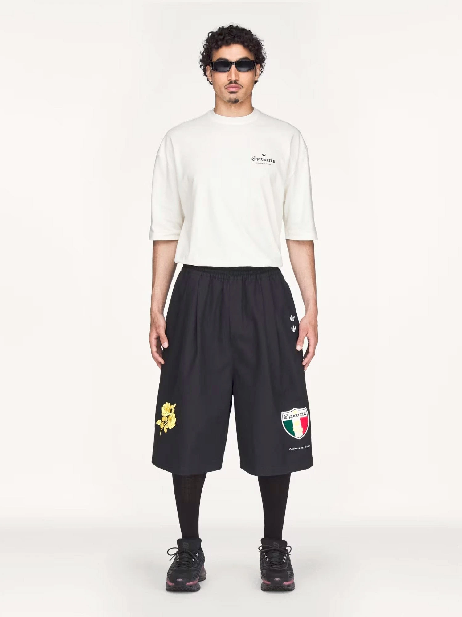 Oversized cotton Bermuda shorts with logo embroidery.webp