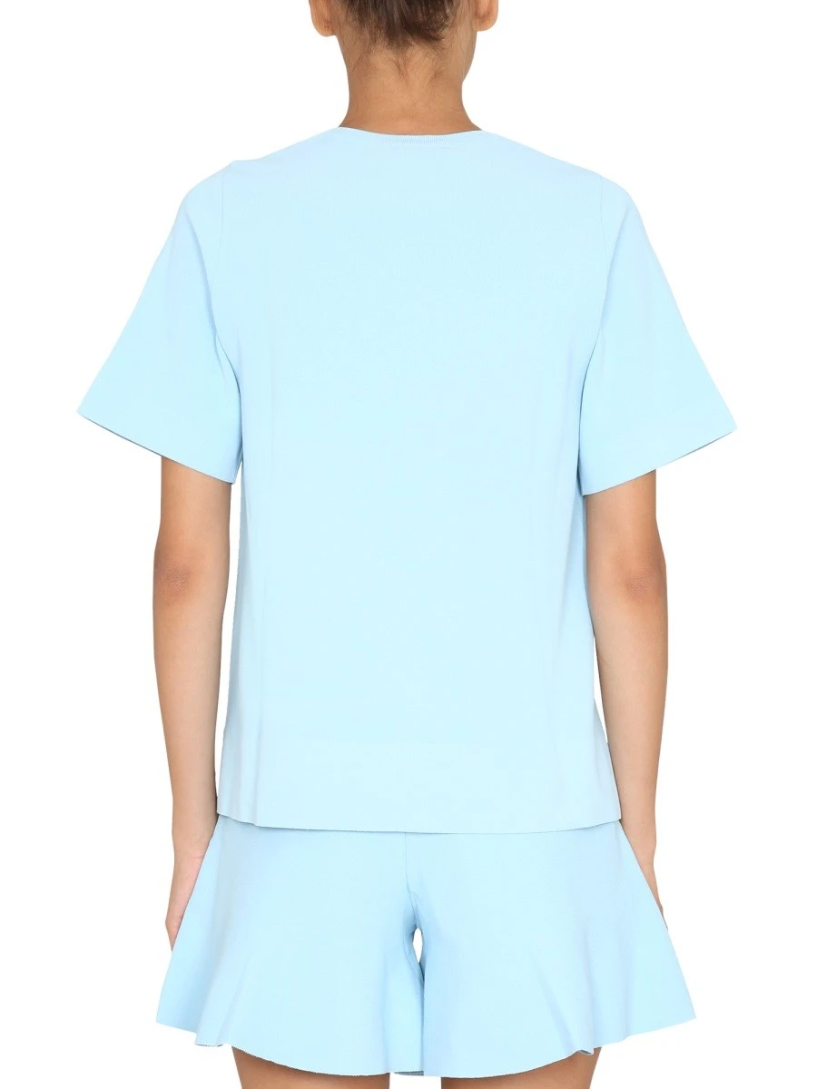 T-SHIRT WITH ASYMMETRICAL HEMLINE.webp